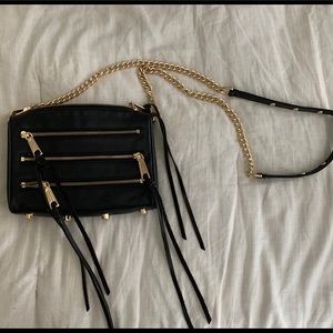 Black Rebecca Minkoff mini mac with gold detailing